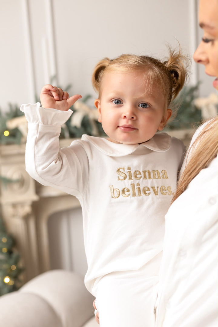 Ivory Rompersuit believes - Embroidered