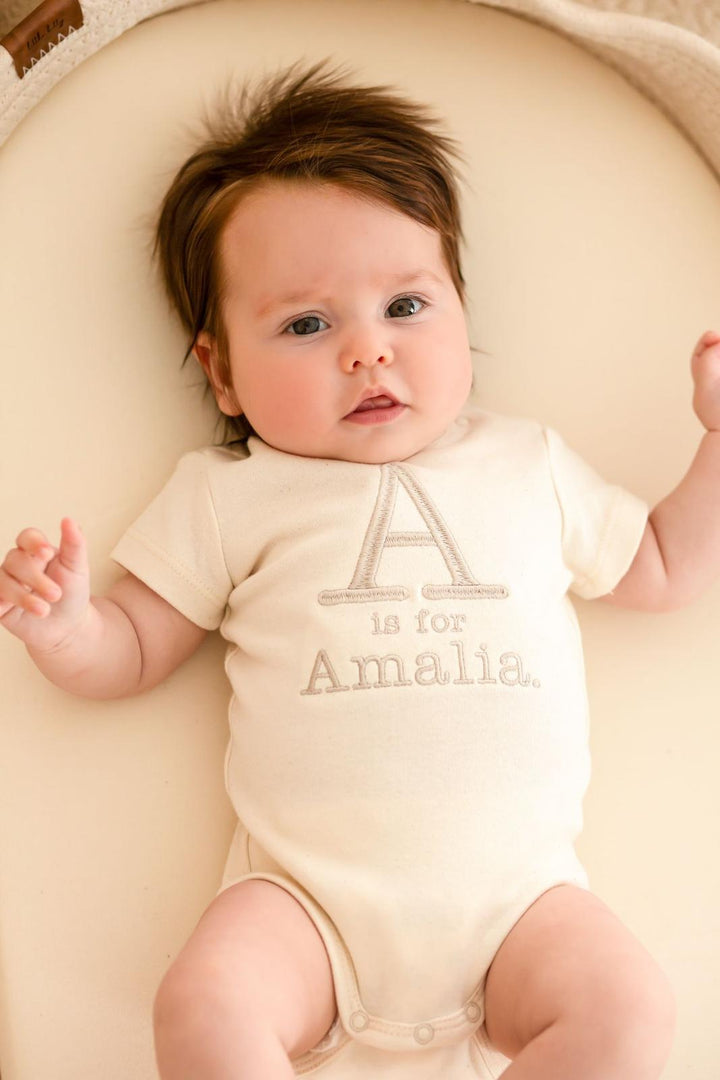 Is for name Signature Baby Bodysuit - Embroidered